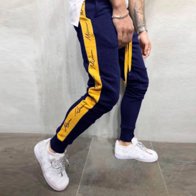 TOTOTAshop.Celana Jogger ROCKET pria,bahan Fleece tebal.motif sablon.fit uk 28-34