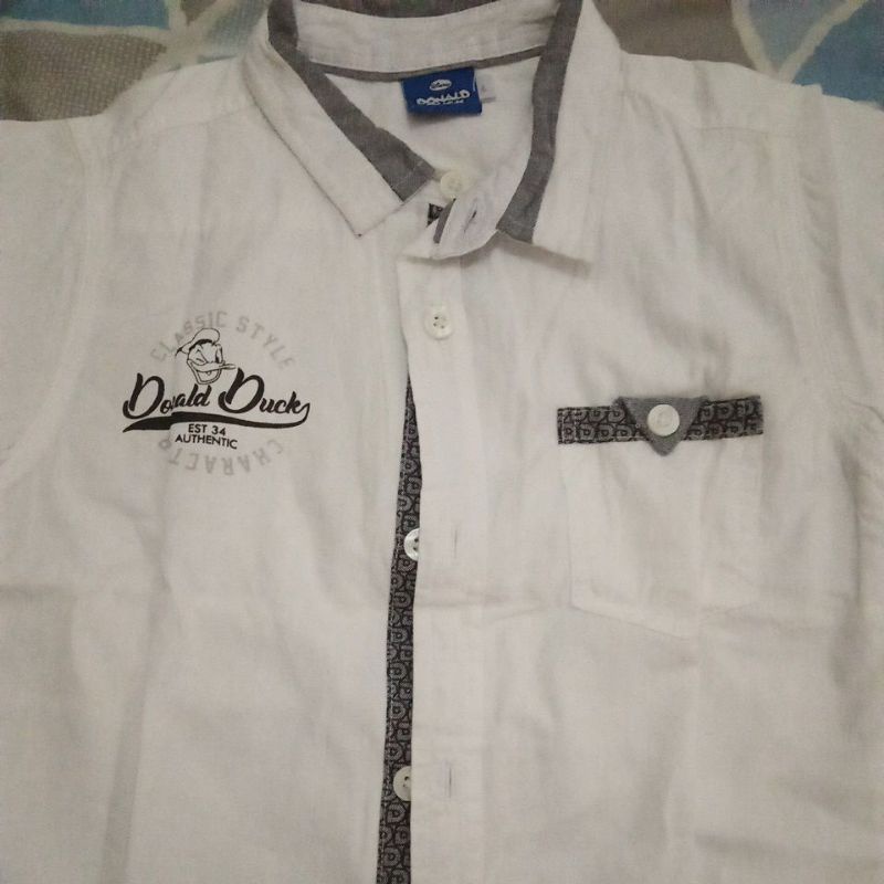 kemeja donald duck