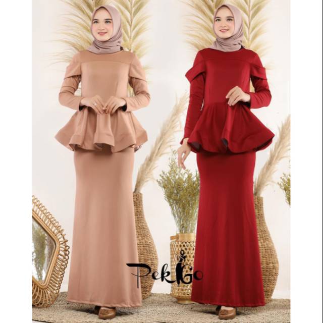 Peplum dress by pekgo