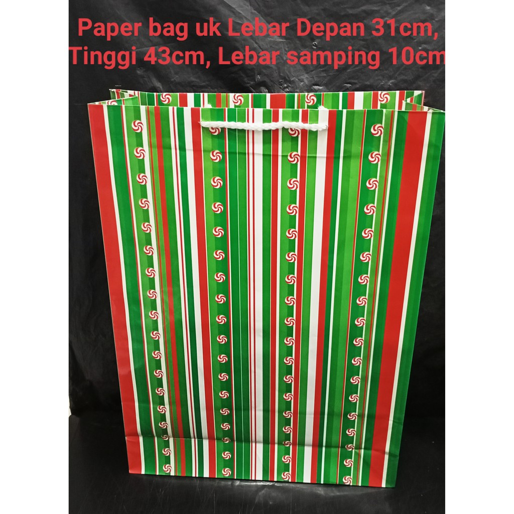 

Paperbag natal ukuran Lebar 31cm Tinggi 43cm Lebar samping 10cm Salur