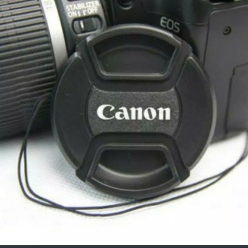tutup lensa kamera Canon DSLR 1100D