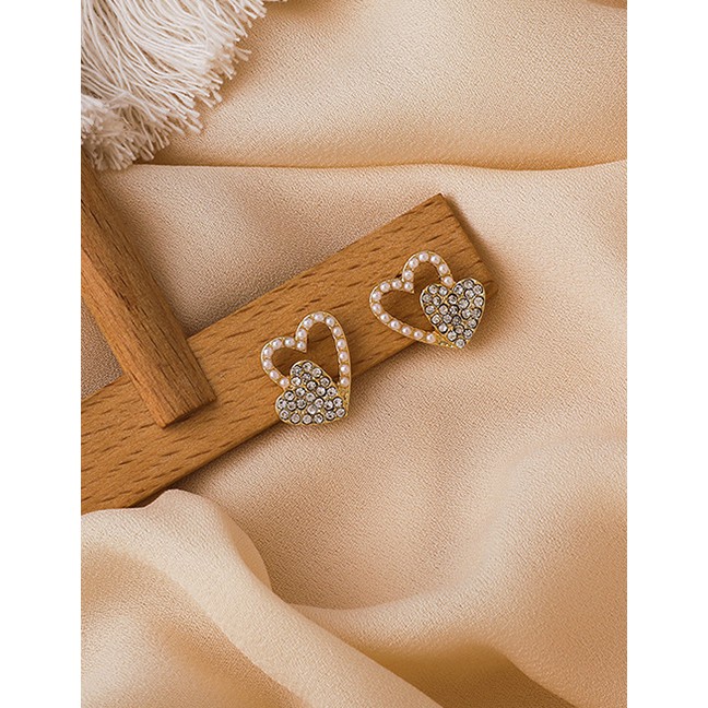 LRC Anting Fashion Gold Color Love Pearl And Diamond Alloy Hollow Stud P71852