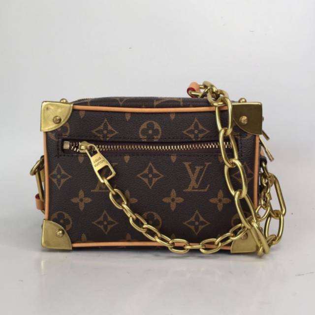 Lv soft trunk bag new gold