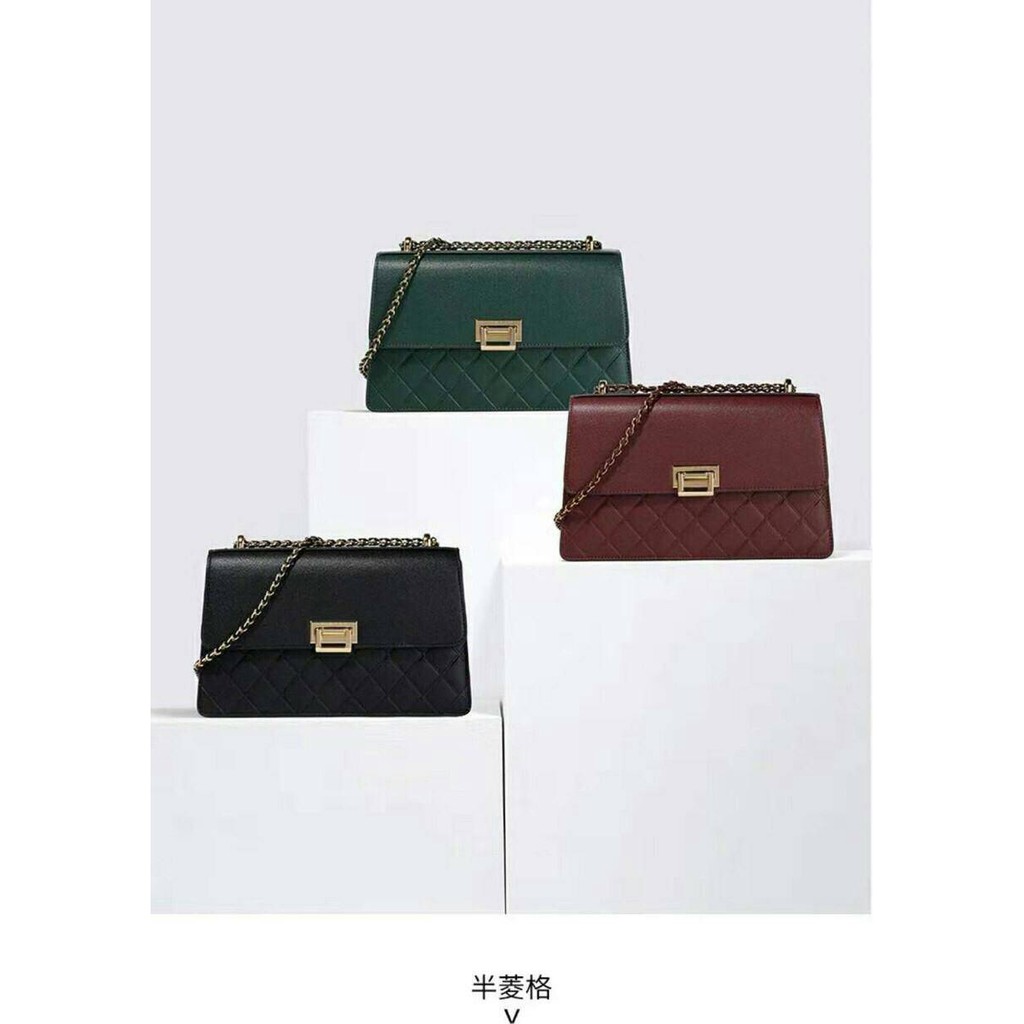 Charles & Keith Quilted push-lock sling bag original