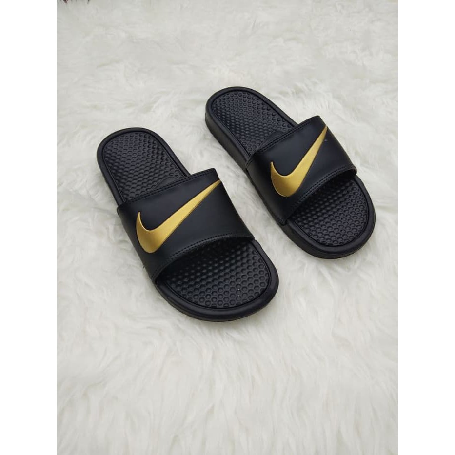 nike sandals black and gold