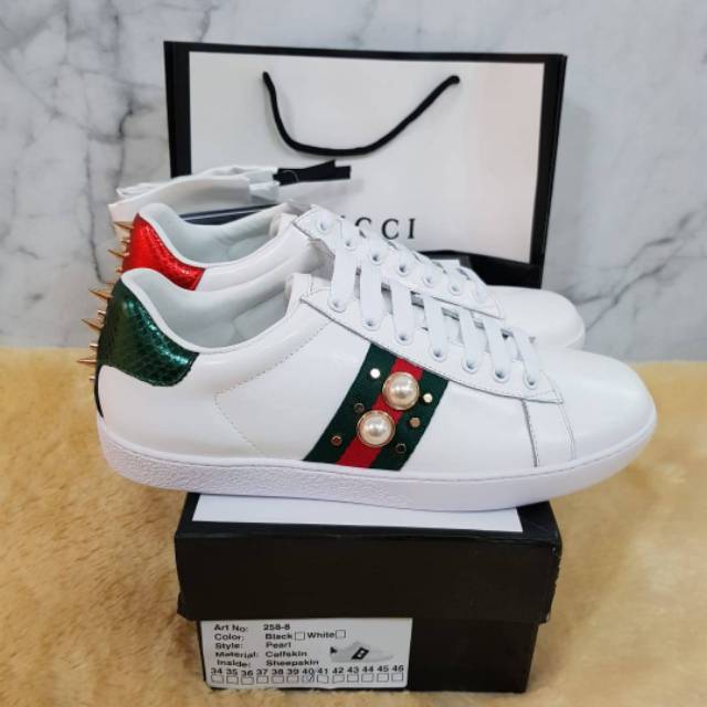 gucci trainers arrow