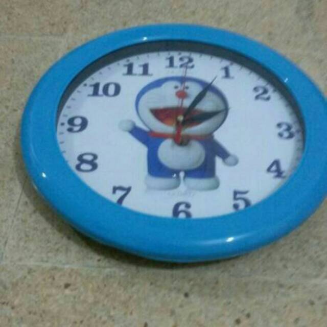 Jam dinding doraemon -+30cm,OGANA mrh kualitas ok