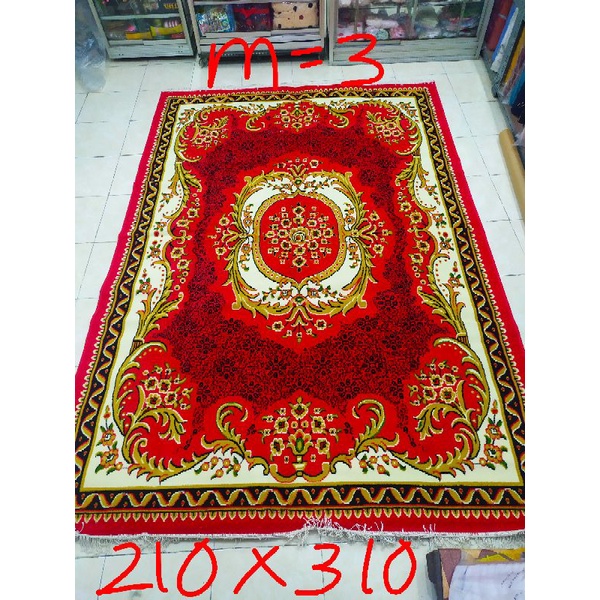 Karpet permadani motif kembang merah