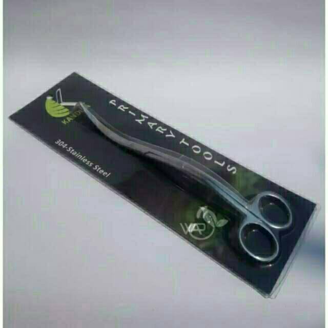 Kandila gunting ombak