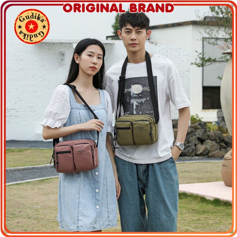 GUDIKA 66112 Original - Tas Selempang Gudika Kece Anti Air Kekinian Cewek Cowok Bisa COUPLE Import bahan nilon waterproof terbaru - pasangan - couple - kapel - kopel - tas wanita - tas pria - slingbag - tas bahu - tas slempang - tas - bag - tas gudika bag