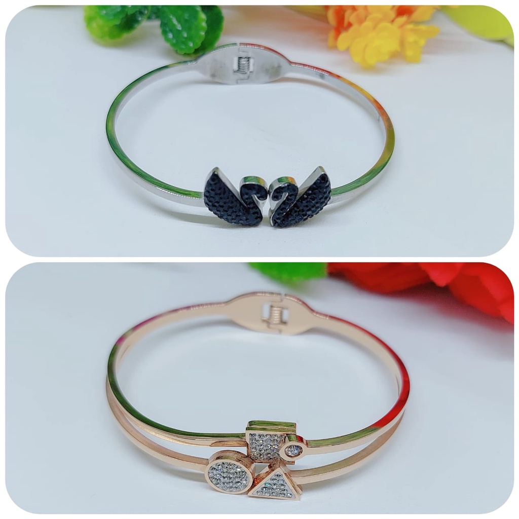 Gelang titanium mata putih dan mata hitam perhiasan fashion