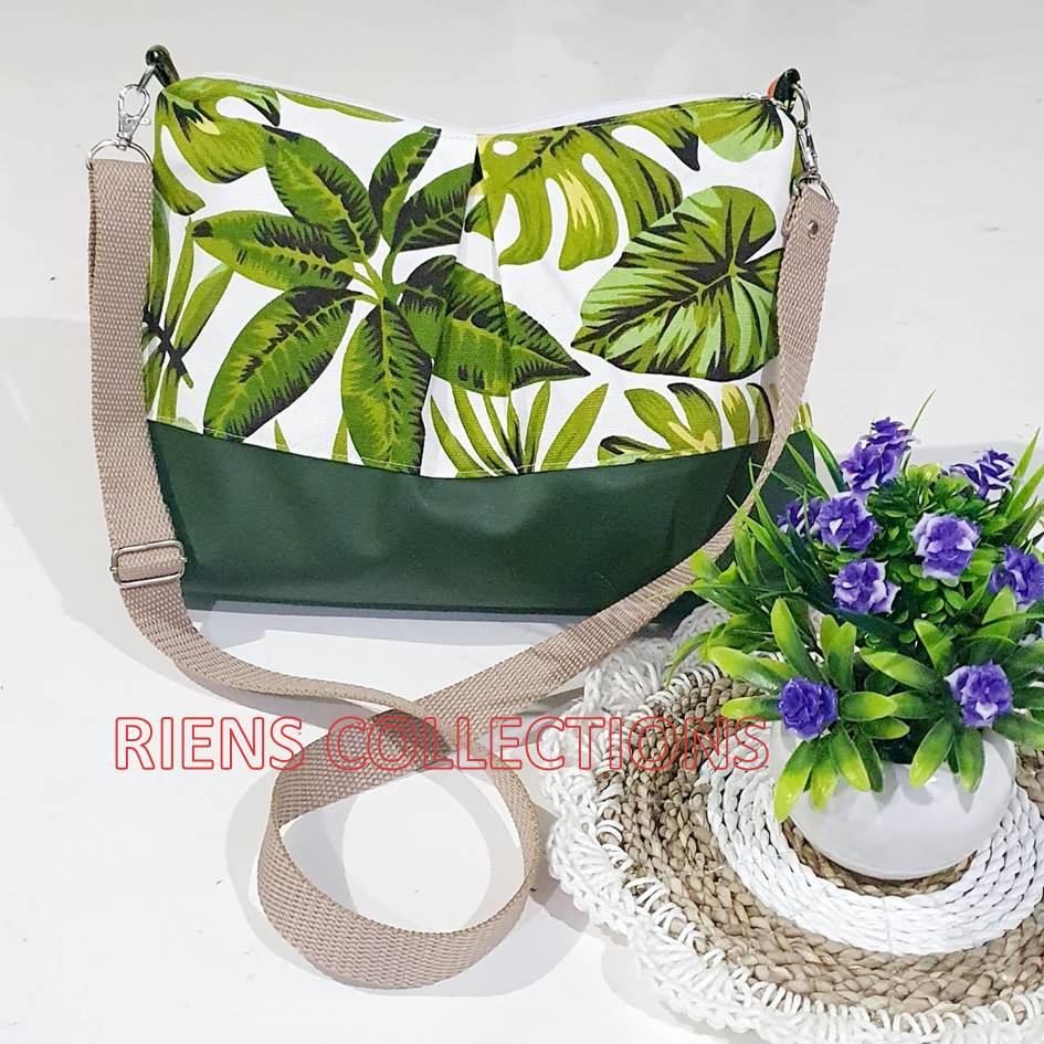 TAS SELEMPANG LIPIT MOTIF ADENIA HIJAU. TAS KANVAS. TAS VINIL. Riens Collections