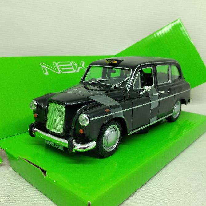 Diecast Austin FX4 London Taxi Welly Nex 1:24