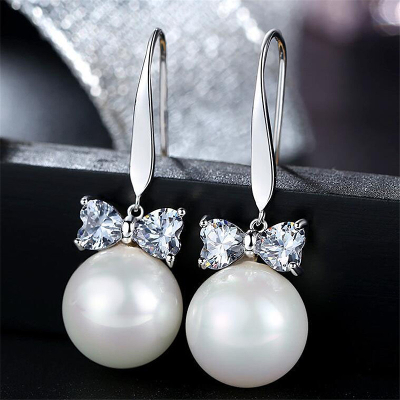 Korean Version of the Zircon Bow Pearl Earrings Female Lovely Ornament