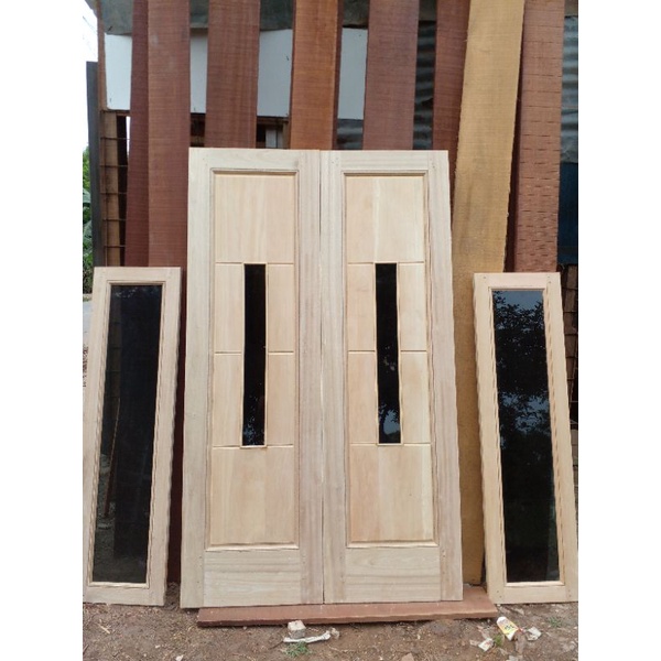 1 set pintu utama (include kusen, daun pintu kupu-kupu, 2 kusen jendela, 2 daun jendela, dan loster) ukuran standar bahan kayu meranti