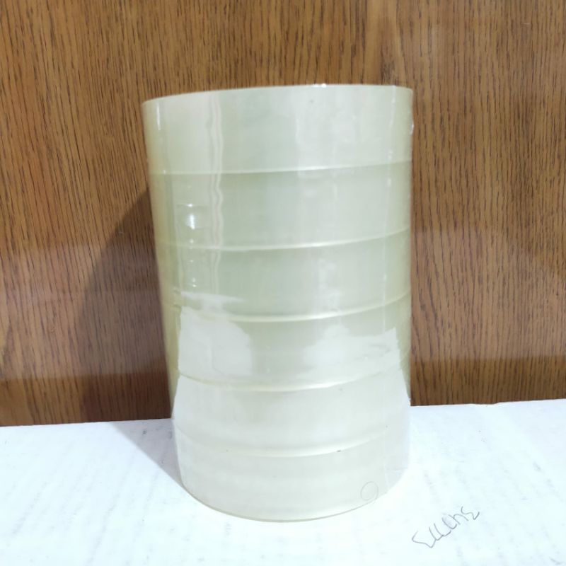 

isolasi bening 1 inchi ( 1 roll isi 6 pcs) isolasi bening perekat