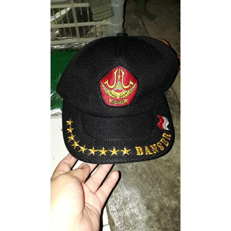 TOPI BANSER