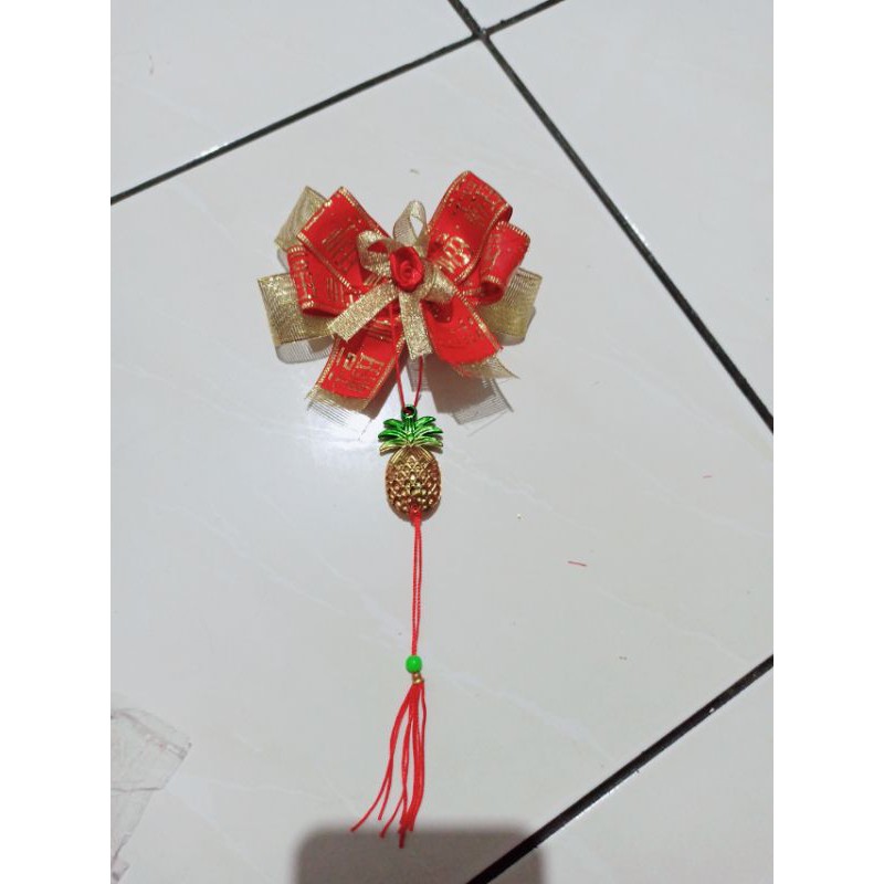 

Pita Imlek chinese new year nanas Tinggi 16 cm panjang 10 cm