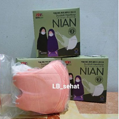 Masker Medis Duckbill Dewasa Hijab Nian Warna Peach Pearl Isi 50 Pcs 3 ply.