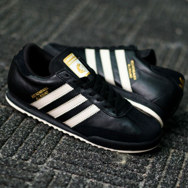 adidas beckenbauer trainers black and yellow