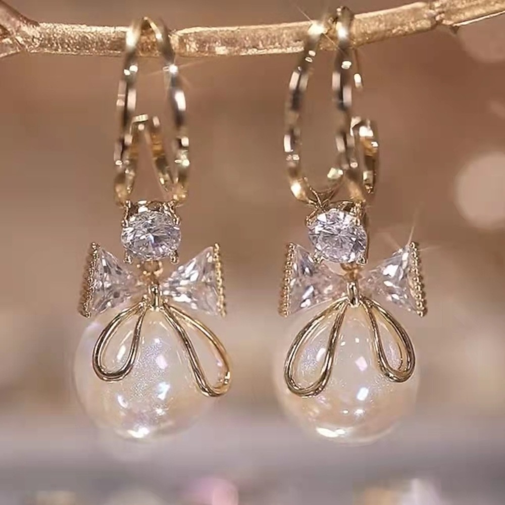 Anting Tusuk Lapis Silver Model Pita Dengan Mutiara Untuk Wanita