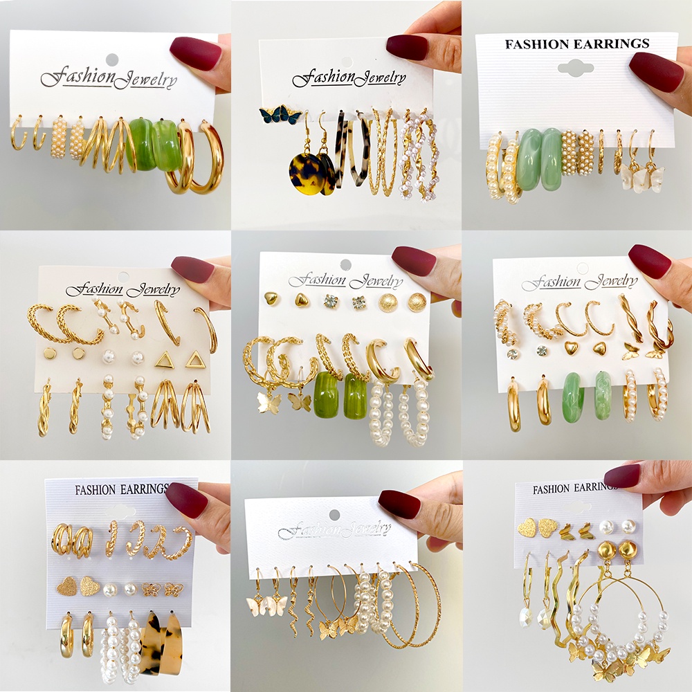 Set Anting Stud Desain Kupu-Kupu Aksen Mutiara Bahan Resin Gaya Vintage Untuk Wanita