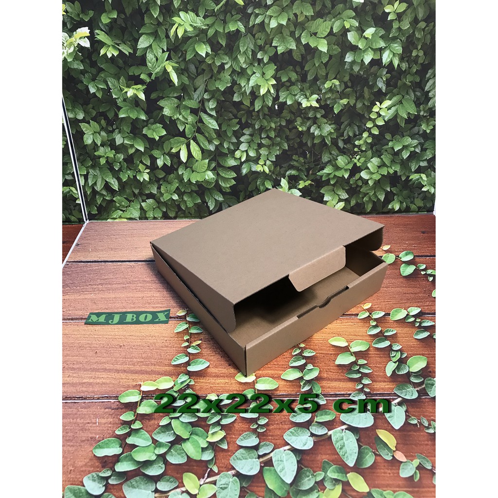 

Kardus Uk. 22x22x5 cm......Die cut untuk packing aksesoris dll, model box pizza