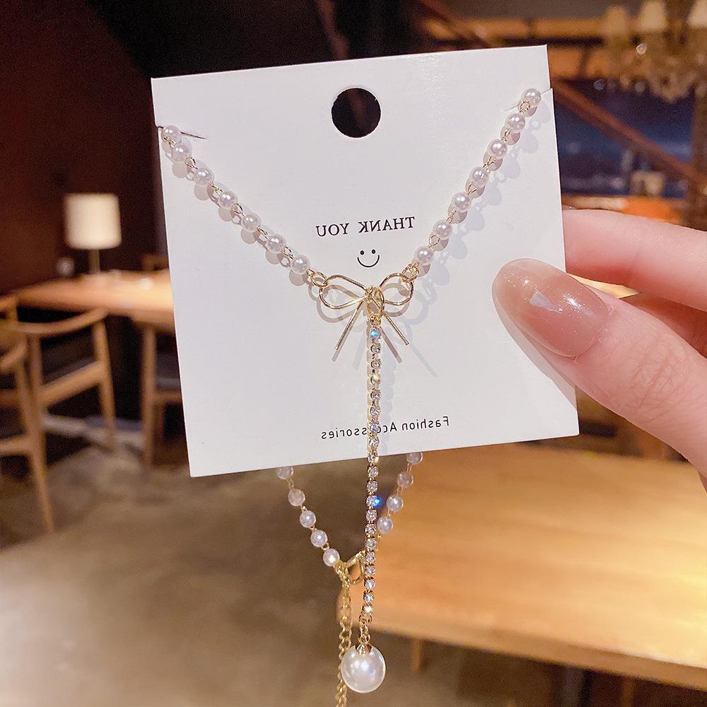 Kalung Choker Rantai Emas Dengan Liontin Pita Hias Kristalmutiara Untuk Wanita