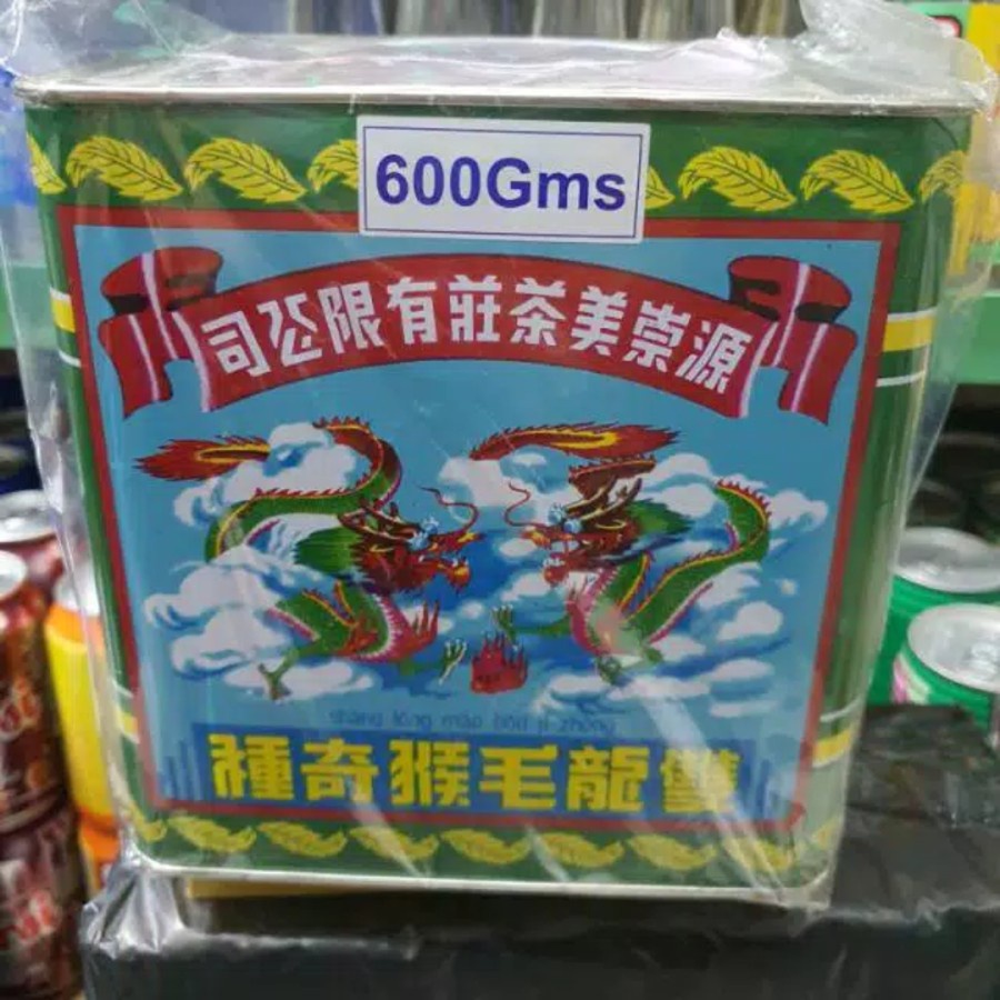 

Daun teh kaleng cap naga pek mo kau teh guan chong bee