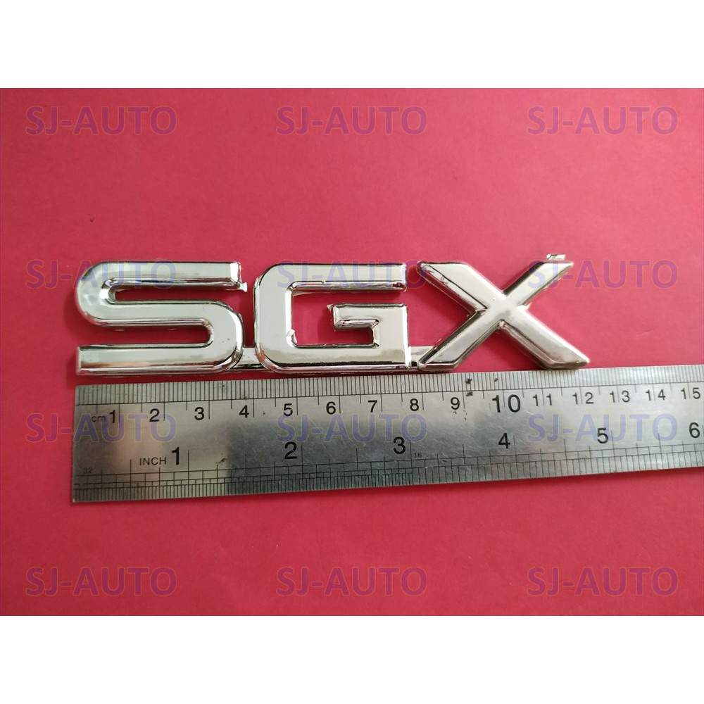 Emblem SGX untuk kijang kapsul