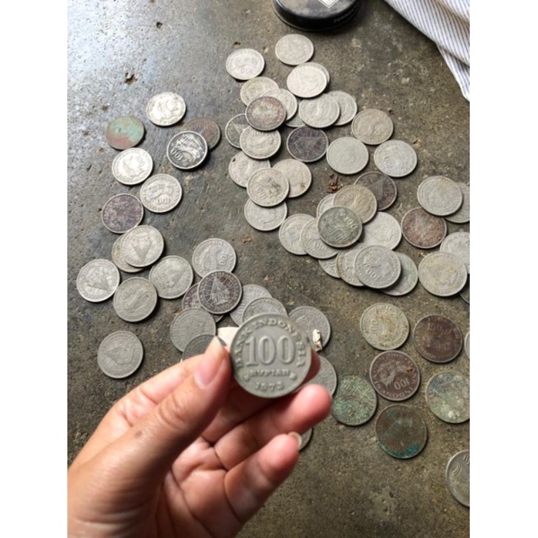 uang logam lama gambar wayang