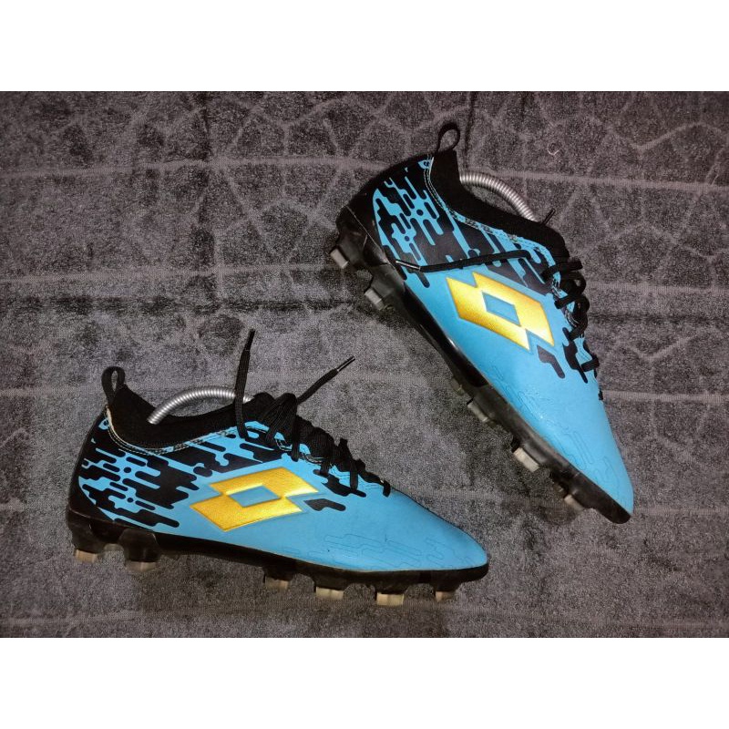 Lotto Veloce FG Solid Atoll/Black/Gold
