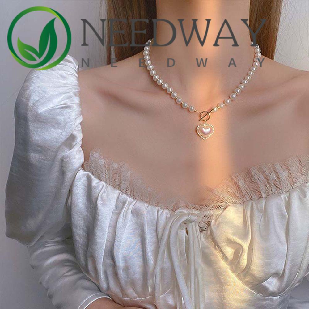 Kalung Choker Rantai Klavikula Bentuk Hati Aksen Mutiara Bahan Alloy Gaya Korea Vintage Untuk Wanita