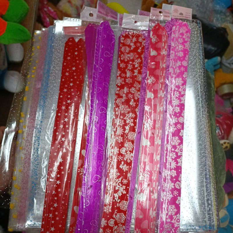 PLASTIK PARSEL DAN PITA KADO KHUSUS UNTUK PAKING KADO