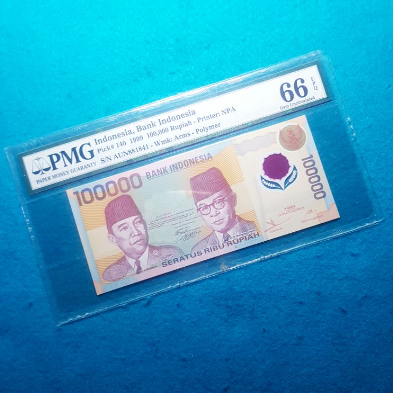 Uang kuno 100000 rupiah tahun 1999 polymer PMG 66 EPQ