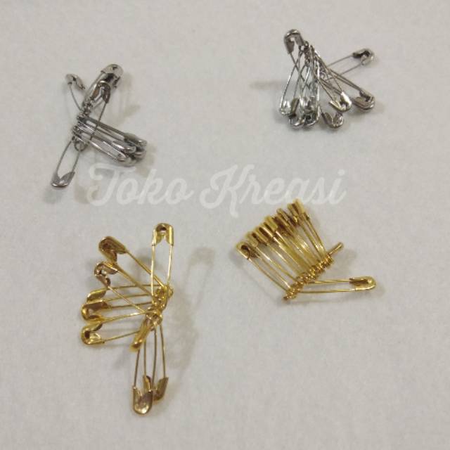 Peniti kecil warna nikel dan gold perikat