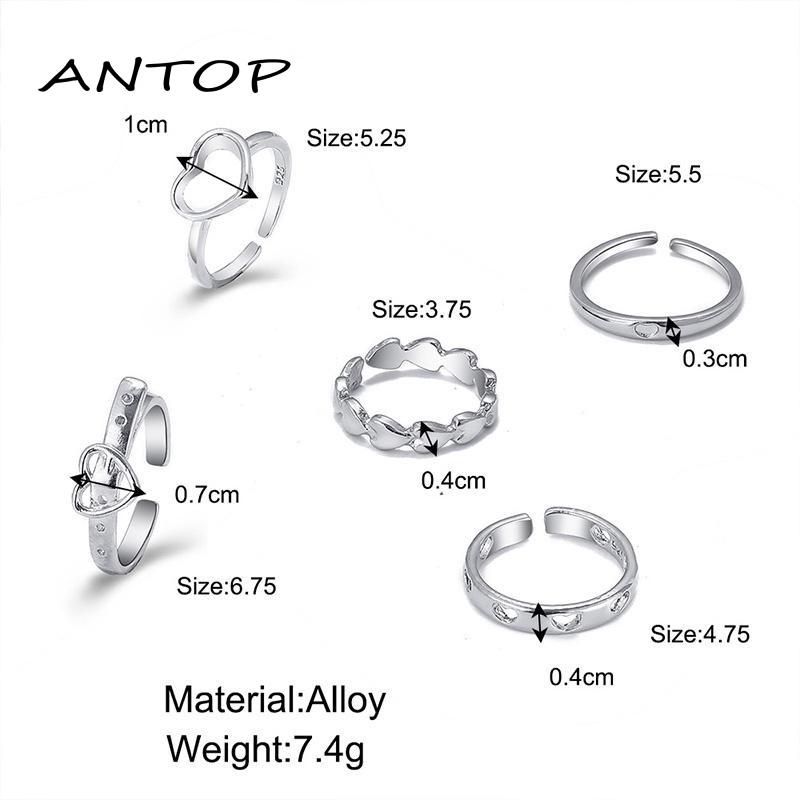 Set Perhiasan Cincin Bentuk Kupu-Kupu Dan Hati Aksen Mutiara Gaya Punk Warna Emas Dan Silver