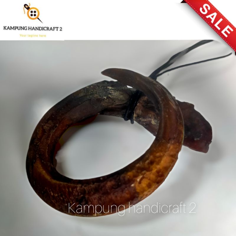 kalung taring babi replika melingkar