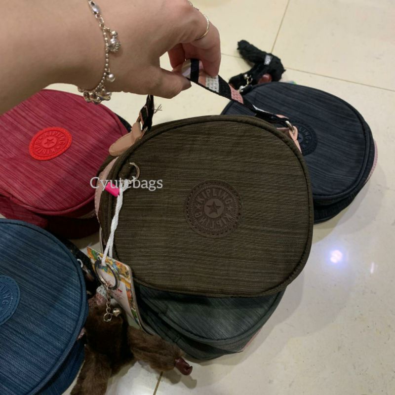 Tas selempang wanita bulat mini Kp kipling Fun Premium crossbody