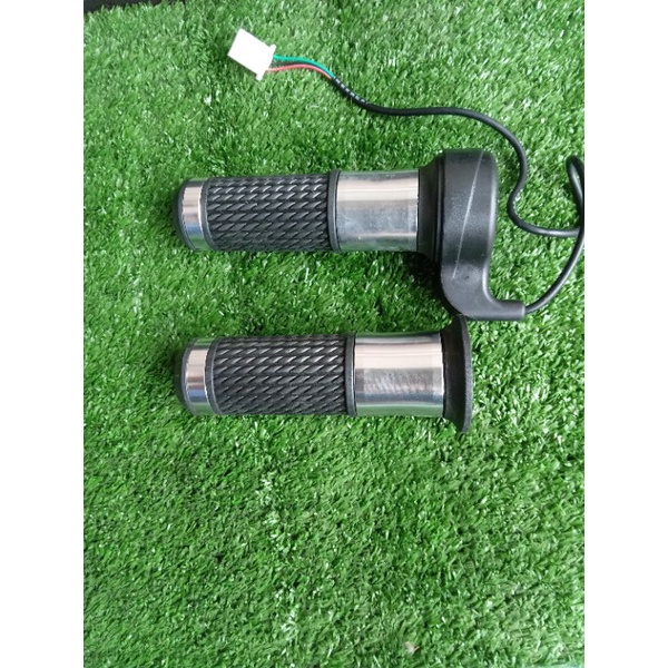 Heandle gas scuter atau trotel sepeda listrik