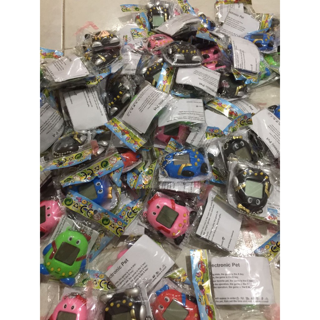 WE Tamagotchi Bentuk Penguin Type 168 in 1 Cyber Pet