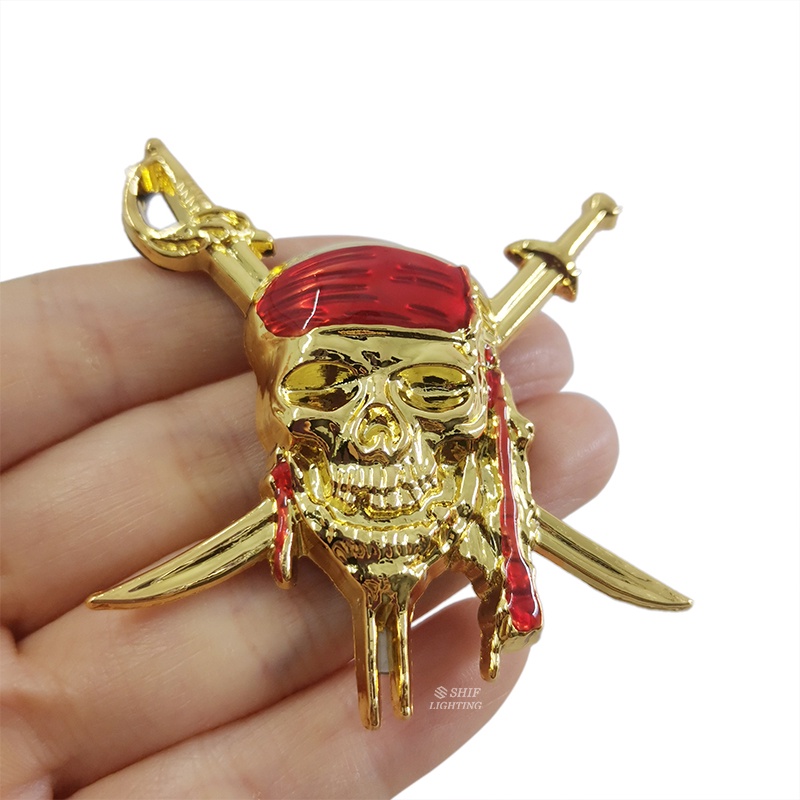 1pc Stiker Emblem Logo Caribbean Pirates of the Caribbean Bahan Metal Warna Emas