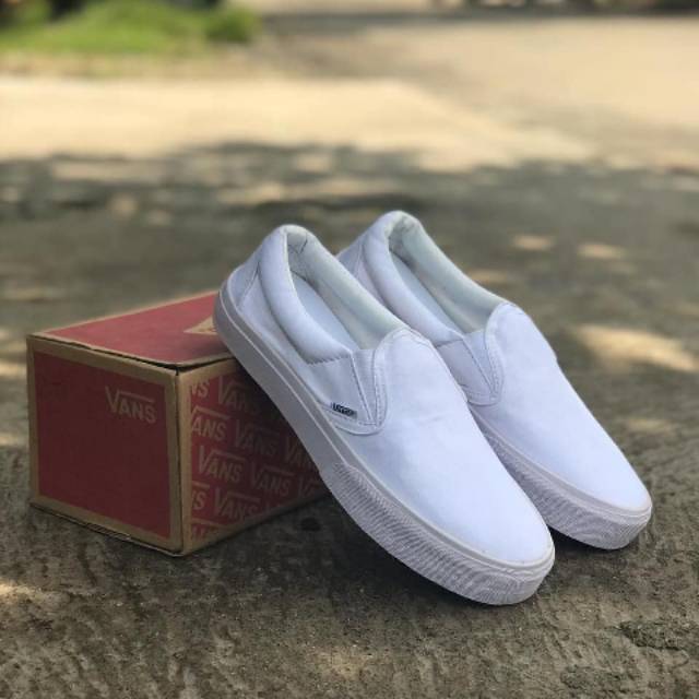 vans slip on total white