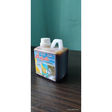 

Madu Hitam Murni Netto 650 ML Asli Pohon Sialang