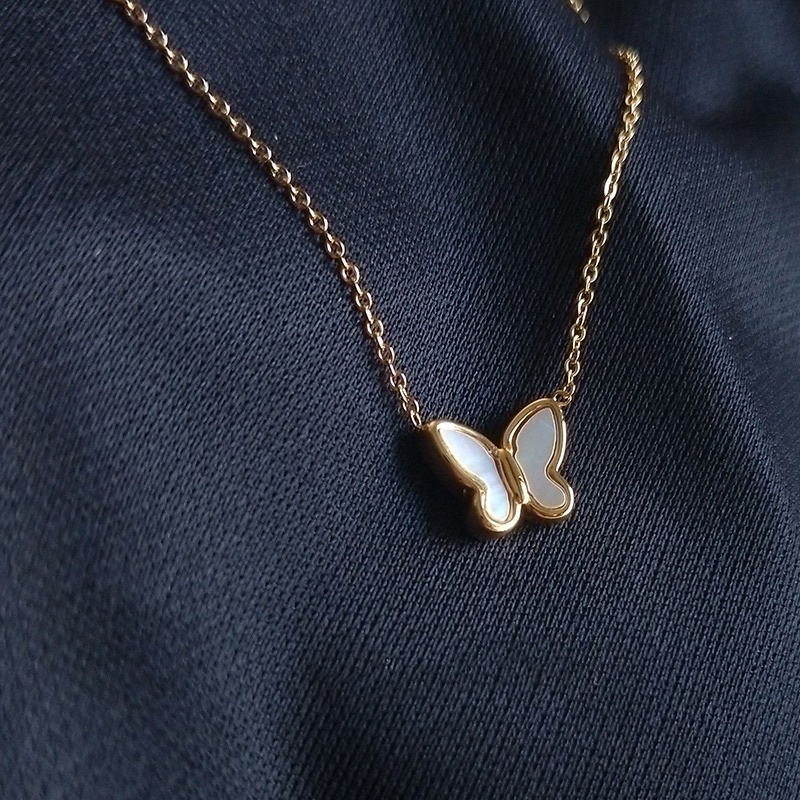 kalung kupu putih kecil cantik korea titanium asli