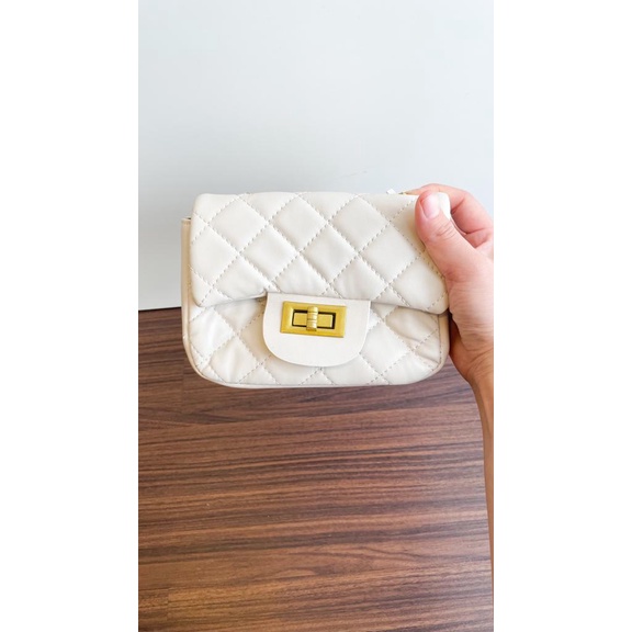 Nara clutch bag