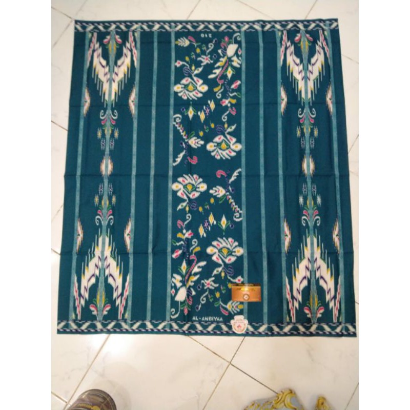 Sarung tenun al anbiya ramadhani motif kembang