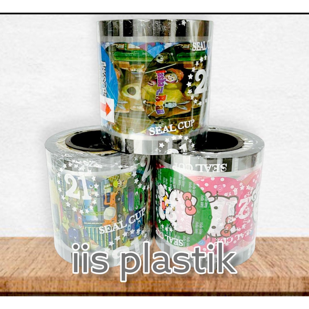 SEAL CUP DAUN TEH POLOS BUAH KARTUN 21 ( Merk random sesuai STOK ) 1000cup - PLASTIK LID SEALER CUP