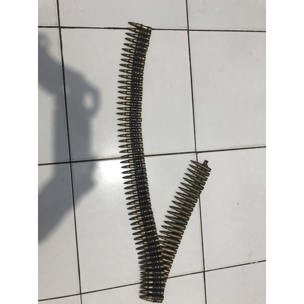 gesper peluru lancip