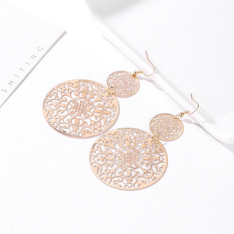 Hot selling European and American fashion earrings, retro hollow disc frosted earrings, palace folk style carved earrings